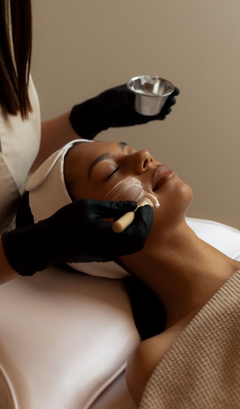 young-woman-having-face-massage-relaxing-spa-salon 6